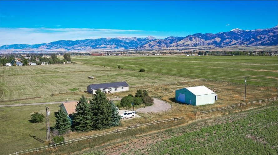 Aerial view of an existing home and shop on the Hidden Valley Road property.