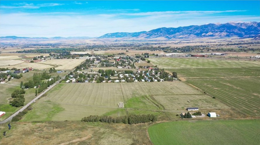 Aerial view of the property and surrounding fields below the Bridger Range.